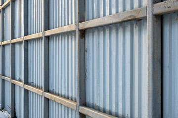 Fence wall made of profiled sheet and metal frame made of square pipes