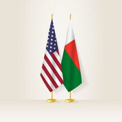 United States and Madagascar national flag on a light background.