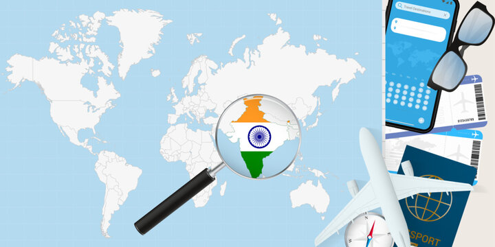 India is magnified over a World Map, illustration with airplane, passport, boarding pass, compass and eyeglasses.