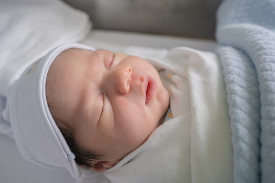 Newborn baby, half Thai, half South African, cute, gentle