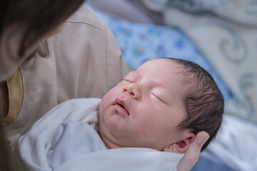 Newborn baby, half Thai, half South African, cute, gentle