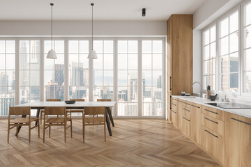 Fototapeta na wymiar Stylish home kitchen interior with cooking and dining zone, panoramic window