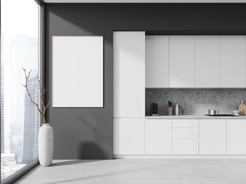 White and gray kitchen interior with poster