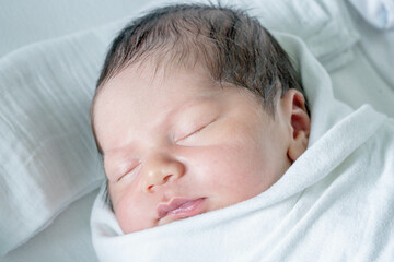 Newborn baby sleeping, half Thai, half South African, cute, gentle