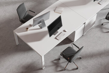 Top view of office workplace interior with pc monitors and chairs in row