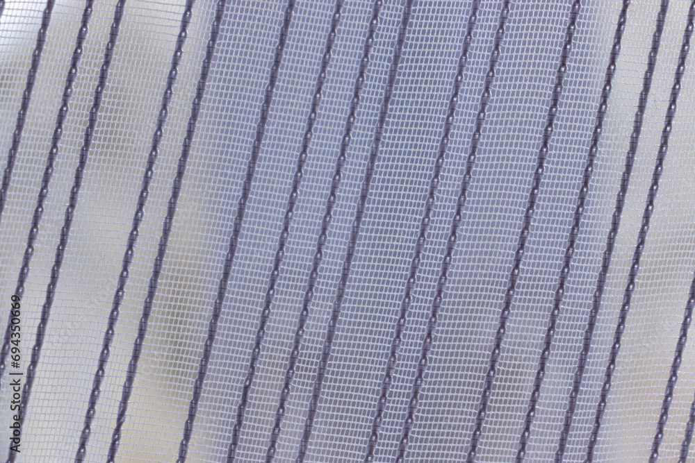 Poster white curtain with delicate texture pattern in home setting.