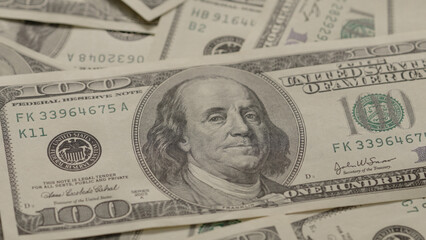 Closeup background of 100 dollar bills old style