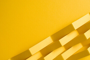 Yellow abstract geometric background divided diagonally
