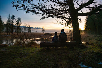 Siblings on a bench on the moor