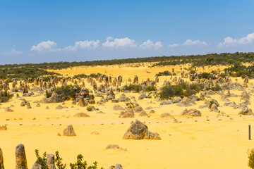 Pinnacles Desert in Western Australia, Nambung National Park, yellow desert, rocks on sand