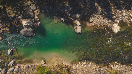 green cold water of Parvati River in Parvati valley - Himachal Pradesh, India