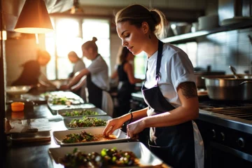 Zelfklevend Fotobehang Master chef cook woman hands precisely cooking dressing preparing tasty fresh delicious mouthwatering gourmet dish food on plate customers 5-star michelin restaurant kitchen close-up detailed artwork © Yuliia