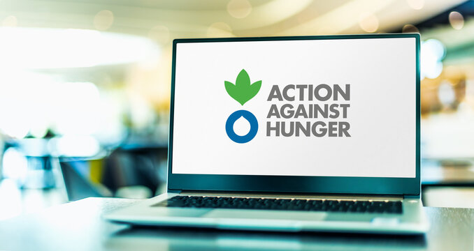 Laptop displaying logo of Action Against Hunger