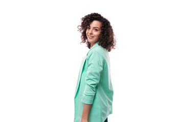 portrait of a young successful brunette employee of a business company woman dressed in an office...