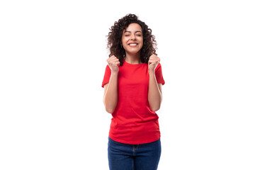 young caucasian active leader woman with black curly hair dressed in red t-shirt with fabric print mockup