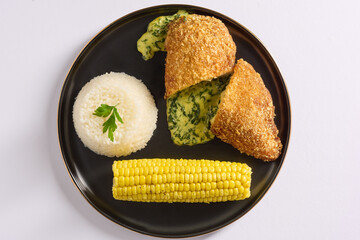 Spinach stuffed cordon bleu on white - top view