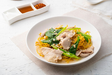 Crispy egg noodles with Chinese broccoli and sliced pork in Thick Gravy sauce