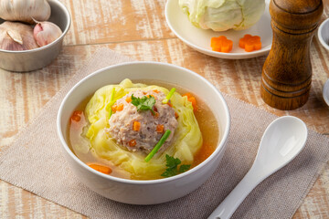 Chinese Cabbage Soup with Minced Pork .Stuffed Cabbage with Seasoned minced pork and carrot in...