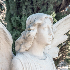 Vintage statue of a sad angel
