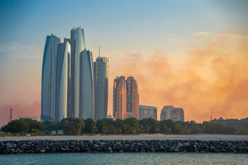 Panorama View of Abu Dhabi Skyline at sunset, United Arab Emirates