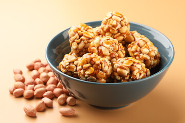indian sweet groundnut ladoo or mungfali or peanut laddo or laddu made using roasted peanuts and...
