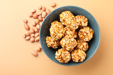 indian sweet groundnut ladoo or mungfali or peanut laddo or laddu made using roasted peanuts and...