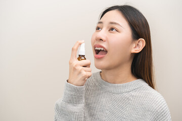 Health care treatment sore throat concept, sick pain asian young woman have cough symptom holding...