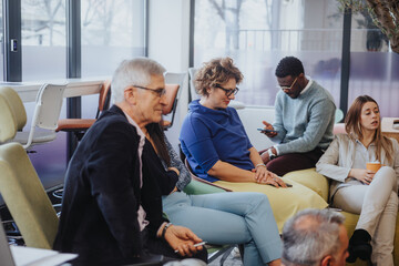 Collaborative Co-Working Space. Multicultural Business Team Achieving Success with Innovation and Productivity