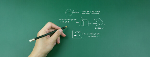 E-learning concept: teacher writes pencil in front of classroom Write a mathematical formula to...
