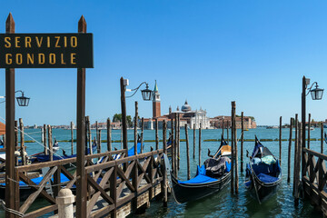 Sign indicating Gondola service at Saint Mark square in city of Venice, Veneto, Northern Italy,...