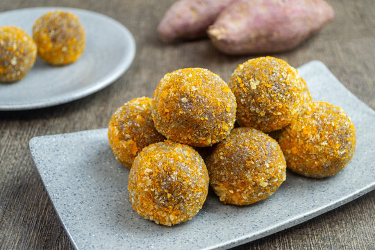 Bola-bola ubi ungu goreng are a snack that is easily found in Indonesia. made from a mixture of steamed purple sweet potato, sugar and tapioca flour that is stirred, shaped into balls and fried.