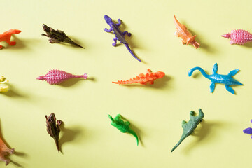 Toy dinosaurs background.  Colorful pile of plastic, toy dinos.