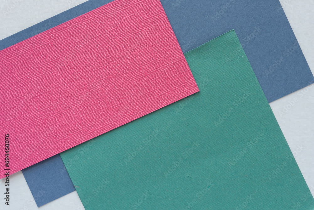 Sticker pink green and blue paper on white