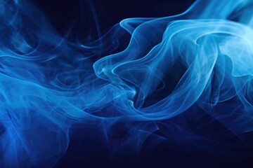 Fototapeta premium Blue smoke captured in a close-up shot on a black background. Perfect for adding a mysterious and captivating element to your designs or projects