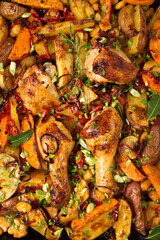 Baked vegetables with ruddy baked chicken, copy space