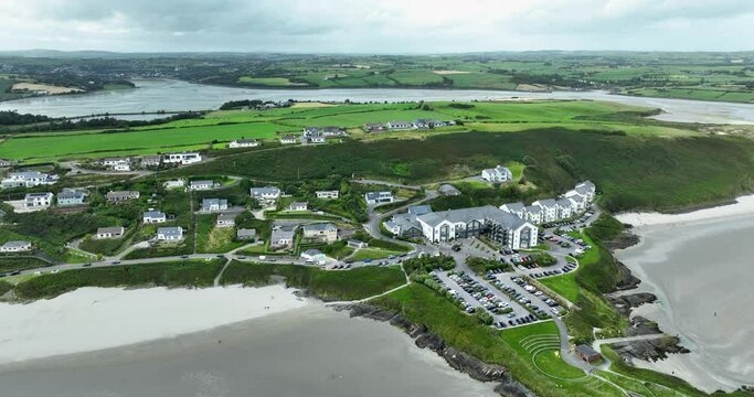 Beautiful white houses on the edge of the beach 