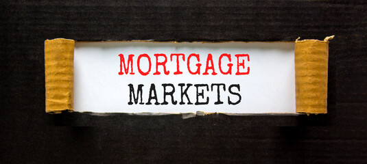 Mortgage markets symbol. Concept words Mortgage markets on beautiful white paper. Beautiful black paper background. Business mortgage markets concept. Copy space.