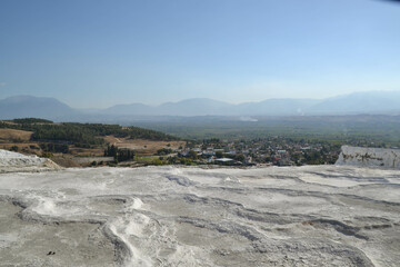 The white travertine, natural, thermal pools and terraces of Pamukkale, Turkey