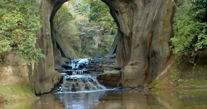 Water falls in Japan.Nomizo Falls and Kameiwa Cave are waterfalls that flow through the Kameiwa cave in Kimitsu City.Nomizo waterfall in kimitsu city.