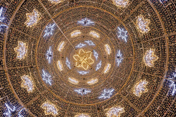 Naklejka premium Interior view of Christmas tree in Puerta de Jerez (Jerez door) in Seville, Andalusia, Spain