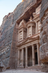 Solitary visit to the Treasury of Petra, Jordan. Side view of the façade and the ruins of the...