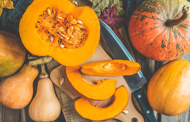 Pile of many multi colored pumpkins and gourds of different shapes and colors. Different kinds...