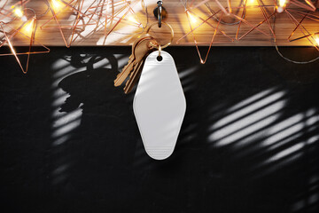 Plastic branded keychain hanging on a hook mockup. 3D rendering - obrazy, fototapety, plakaty