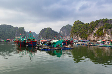 Floating fishing village in Halong Bay, Vietnam, Southeast Asia..
