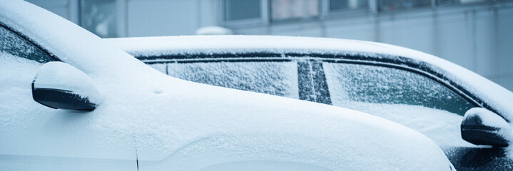 Parked cars covered with snow - obrazy, fototapety, plakaty