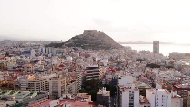 Skyline of Alicante city in Spain, with a medieval castle Castell de Santa Barbara. Attractive tourist destination and municipality centre for real estate tourism investment. 