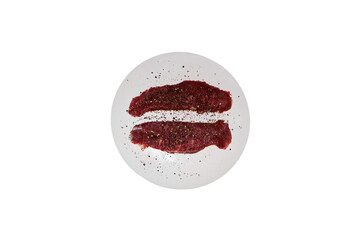 Two Raw Rump Steaks with salt and pepper on the white plate ready to roast isolated on transparent background
