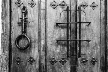 Old wooden door and vintage door knocker
