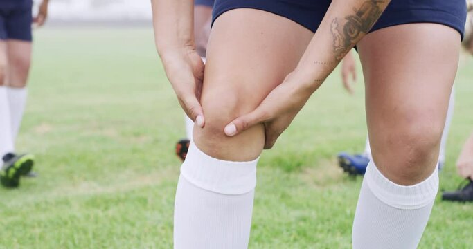 Closeup, rugby and woman with knee pain, player and injury on field in sports training, accident or workout game emergency. Person, outdoor and competition with athlete, muscle tension and strain