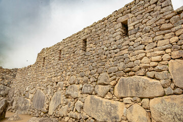 Ancient streets inside machu picchu. This is the view of the space between the house's in the city in the archeological site